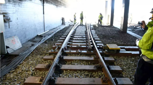 (a) Composite sleepers in track