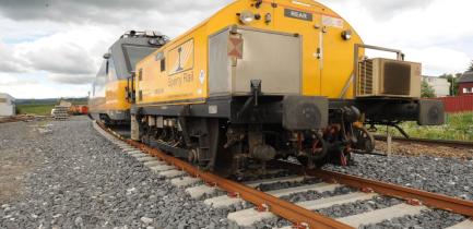 (c) Sperry Rail unit